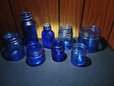 Vintage cobalt blue jars..vicks  noxema..  2  bottles lot of 8 picture