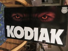 KODIAK SMOKELESS TOBACCO METAL SIGN (BIG BROWN BEAR EYES) picture