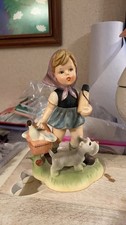 Vintage Hummel Style Figurine of Girl with Dog picture