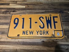 Vintage Orange New York 1973-1986 License Plate 911 Good Condition picture