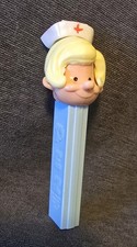 Vintage BLONDE NURSE - PEZ Dispenser - No Feet US Pat 3.8 Light Blue Base (USA) picture