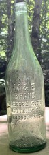 1924 M & E brand hancock michigan glass bottle 24 fl oz  11 3/4