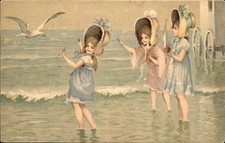 Children wading at the beach Bonnet Hats Seagull Illustrated c1910 Postcard bhn picture