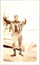 1920s Sepia Photograph Proud Angler with Fish Stringer & Rowboat Lake Shore picture