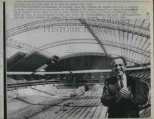 1971 Press Photo Bert Rose stands high inside the Dallas Cowboys stadium. picture