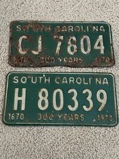 Lot of 2 different 1970 South Carolina License Plate Tag Pair  300 Years picture