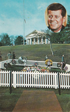 John F Kennedy Gravesite With Photo White Fence Flowers Souvenir Postcard picture