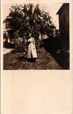 Postcard Real Photo RPPC Woman Standing Next to Tree in Front of House picture