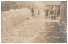 1912 Ionia, Michigan - REAL PHOTO Snowy Street Scene, Barber Shop - Old Postcard picture