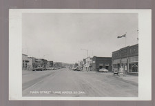 Lake Andes SOUTH DAKOTA RPPC 1959 MAIN STREET STORES nr Geddes Pickstown SD B1 picture