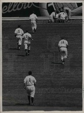 1940 Press Photo Max West of Boston Bees Teammates Rush to Aid - nea07188 picture