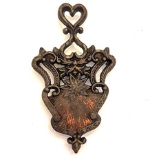 Footed Cast Iron Trivet J.Z.H 1948 Sunburst Trivet Heart Handle picture