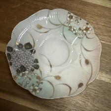 vintage bone china teacup saucer with a hand-painted gold floral design picture