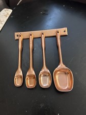 Vintage Color Craft Measuring Spoons And Hanger Set of 4 Copper Color Aluminum picture