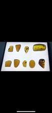 Lot of 9 Polished Fluorescent Amber, Glow Under UV picture
