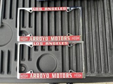Los Angeles Arroyo Motors Datsun Dealership License Plate Frames Set of 2 NOS picture