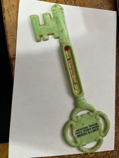 vintage 1950s molded plastic key-shaped souvenir wall thermometer picture
