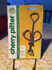 Vintage 1982 Rowoco Elmsford NY Stainless Steel Cherry Pitter NEW ON CARD #735 picture
