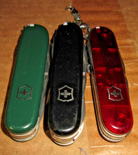 LOT OF 3 Victorinox Cybertool ) Swiss Army Knife COLORS RED, BLACK, GREEN picture