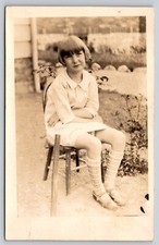 Postcard RPPC Young Girl Seated on Chair in Garden Real Photo Bangs picture