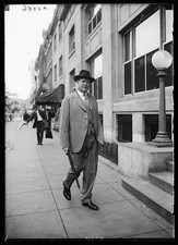 Photo:Unknown City 1920s Man in Suit and Hat Walking on Sidewalk picture