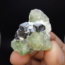 Green Peridot Crystal with Octahedral Magnetite - Sapat Gali, Pakistan picture