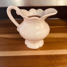 White ceramic creamer pitcher picture