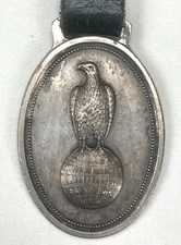VINTAGE J I CASE THRESHING MACHINE CO RACINE ABE EAGLE GLOBE WATCH FOB C1910-20S picture