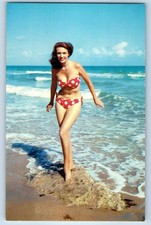 c1960's Beach Bathing Beauty Swimsuit Greetings From Coney Island NY Postcard picture