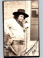 c1935 Cowboy Man Drinking Moonshine Revolver Bandana Signed “Treadwell” RPPC picture
