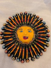 Talavera sun face, Alambre Mexican artist Gerardo Garcia  picture