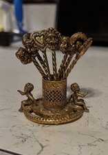 Vtg Baroque Brass Cherub Cocktail Pick Set 7 Putti Appetizer Picks Holder picture