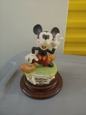 8 Laurenz Mickey Mouse figurines . includes 1928, 31, 36, 40, 41, 47, 55, and 88 picture