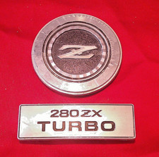 1981-83 Datsun Nissan 280ZX Turbo Center Console Emblem and Hood Emblem picture