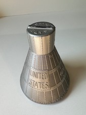 1961 Project Mercury Space Capsule Bank, silver plastic, vintage collectible picture