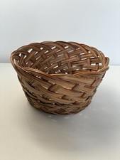 Vintage round, open-weave natural fiber basket, textured crisscross design picture