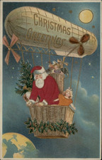 Rare~SIlk Santa Claus  in Hot Air Balloon Blimp Zeppelin Christmas Postcard~s261 picture