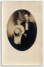 Young Man and Child w/Hat Antique Real Photo Postcard picture