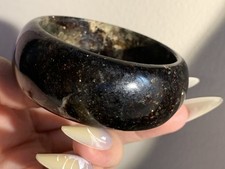 56.1mm Wide Natural Shinning Black Astrophyllite Bangle picture