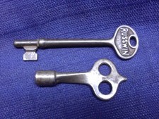 Lot of 2 Antique Vintage Keys  One is a RUSSWIN Key picture
