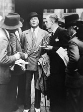 British financier FW Rockett surrounded by journalists after landi- 1935 Photo picture