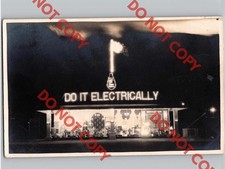 WOW c1915 Melco E Service “Do It Electrically” Night View Light Art RPPC Photo picture