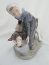 Royal Copenhagen #779 Milkmaid Feeding Calf Porcelain Figurine picture