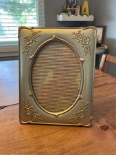 Vitage 5x7 silvertone ornate floral design picture frame with oval front picture