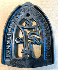 Antique Early Advertising ART Cast Iron Sad Trivet Stand Holder FANNER MFG OHIO picture