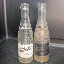 Vintage 1950s Nesbitt's of California ACL Glass Soda Bottles White & Black picture