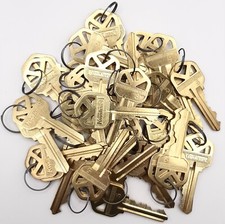 New Kwikset factory brass precut keys. 40 keys, 20 pairs. Locksmith, rekeying picture