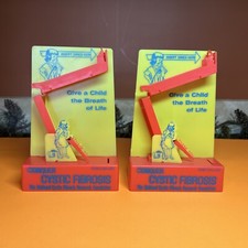 LOT OF 2 Conquer Cystic Fibrosis Dime Donation Collector Tigrett Industries picture