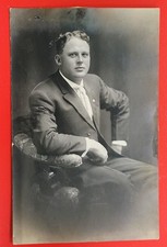 RPPC Handsome Young Man Sitting On Chair Confident Pose Beautiful Eyes picture