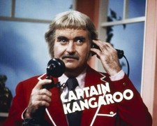 Captain Kangaroo Bob Keeshan in red jacket holding telephone 12x18 inch Poster picture